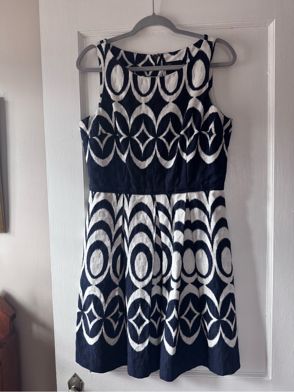 Sleeveless summer dress.  Blue & White Patterned.  2 small spots seen in pics